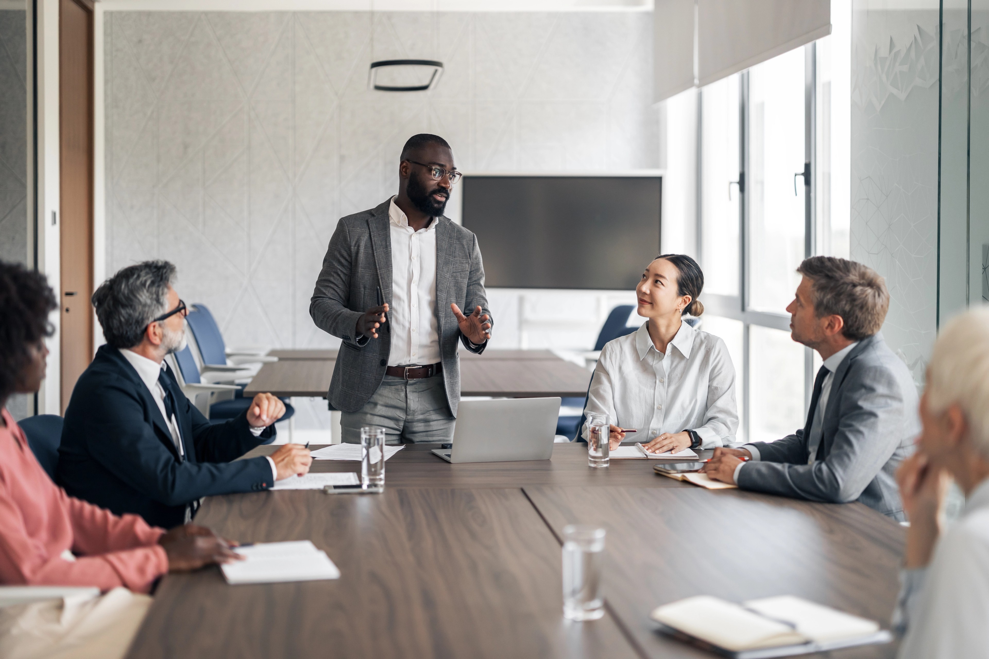 General counsel discussing risk in boardroom